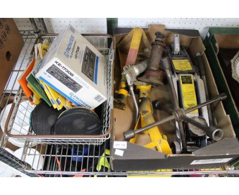 A selection of car tools, a retro stereo and speakers and a selection of road maps.