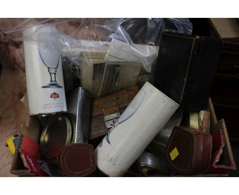 A box containing a large quantity of items including golly badges, AA badges, RAF badges, Ronson lighter, watches, truck mode