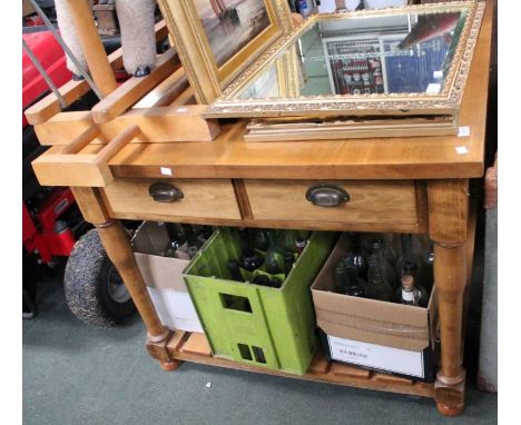A substantial light beech&nbsp;square table, two drawers either end, on four turned legs over slatted base