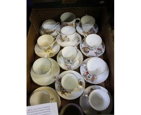 A box of Royal commemorative cups and saucers.