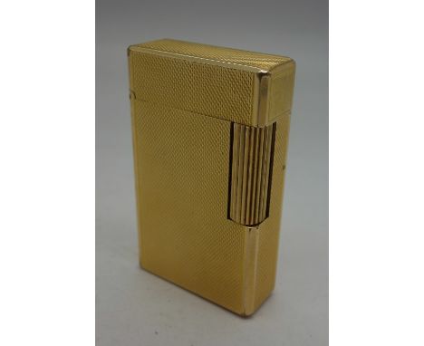 A gold plated Dupont lighter