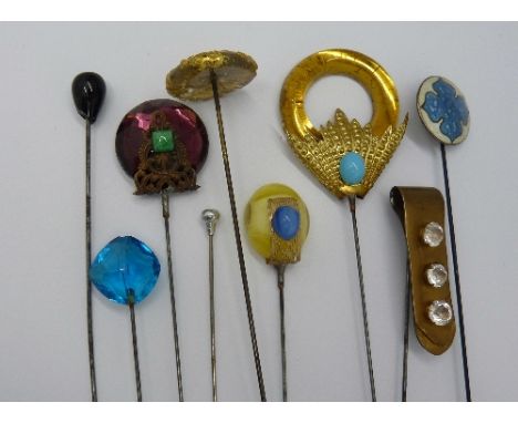 A silver and enamel James Fenton hat pin, Birmingham 1911 and eight other hat pins