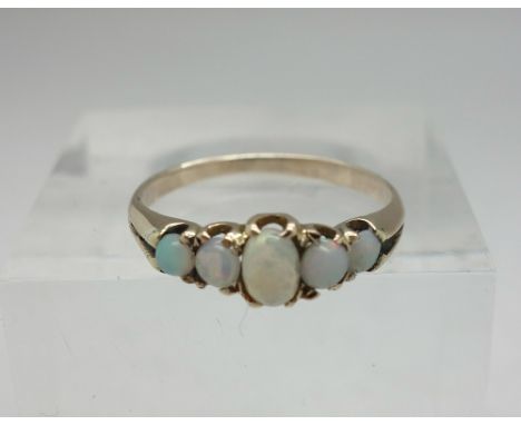 A 9ct gold and five stone opal ring, weight 1.3g, size K