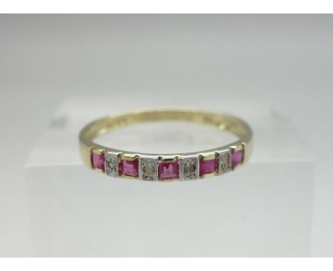 A 9ct gold, ruby and diamond ring, weight 1.0g, size N