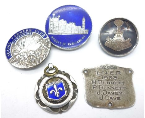 A The Yorkshire Regt. of Princess of Wales Own badge, a silver and enamel Houses of Parliament badge, a Young Farmers' Club H