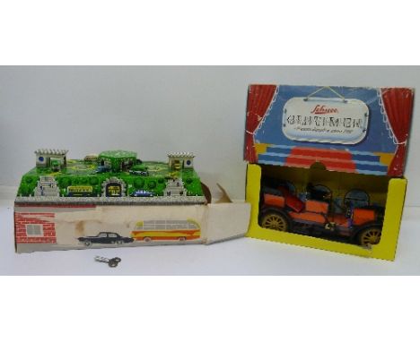 A Schuco Old Timer Mercedes car and a Russian tin plate clockwork toy