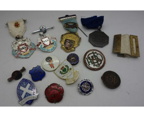 A collection of badges and medals including an enamel Scottish Rest House for Servicemen, Edinburgh, TGWU, and Hampshire W.I.