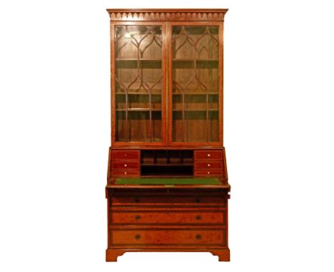 Edwardian inlaid and crossbanded satinwood two section bureau bookcase, the upper section fitted four shelves enclosed by a p