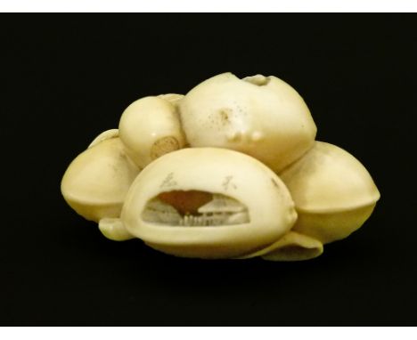 Gyokuhosai Ryuchin - 19th Century Japanese carved ivory netsuke in the form of a cluster of Ginkgo Nuts and Acorns, three of 