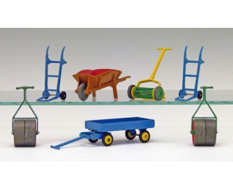 Dinky diecast - Seven garden implements - Garden Roller (381) x 2, Wheelbarrow (382), Four Wheeled Hand Truck (383), Grass Cu