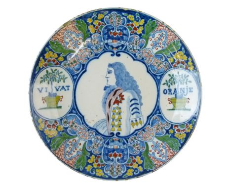 Dutch Delft Royal Commemorative dish dated 1750, decorated in polychrome with a half length portrait of William IV of Orange 