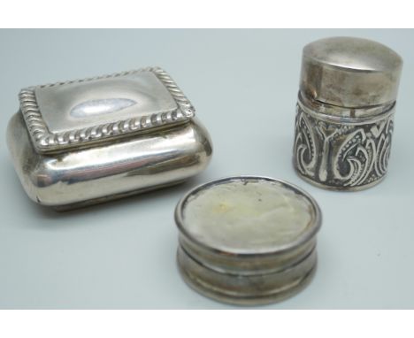 A late Victorian silver box, a circular silver pill box and a thimble case