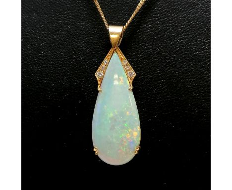 18ct gold mounted opal teardrop pendant (3.5cm drop) with diamond detail at top on a 9ct marked gold 40cm chain - total weigh