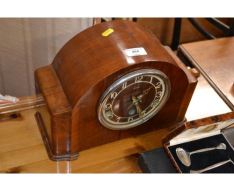 An Enfield walnut case three hole mantel clock 