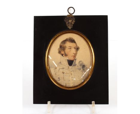A mid-19th Century watercolour portrait, of a military gentleman in black papier m&acirc;ch&eacute; frame, 14.5cm x 17.5cm; a