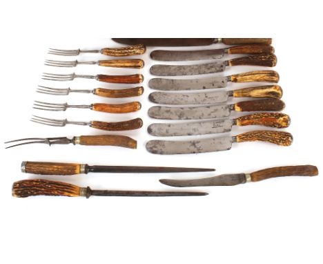 Seven antique antler horn handled steel bladed knives, stamped W&amp;R Shear Steel; six matching horn handled three tine fork