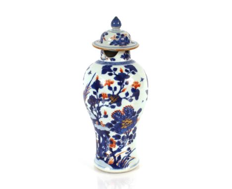 A&nbsp; 19th Century Chinese blue and white baluster vase, decorated figures in an exotic garden setting, blue scale ground a