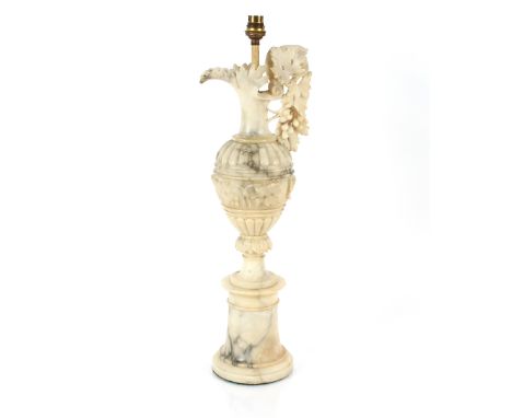 An early 20th Century alabaster table lamp of ewer form, 61cm high overall