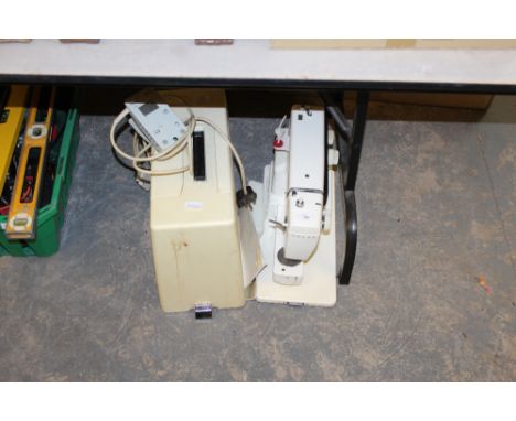 Singer 427 sewing machine with instruction leaflet
