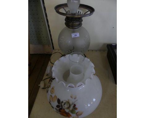 A 20th Century electric table lamp formed of parts from various oil lamps (sold electrically untested)