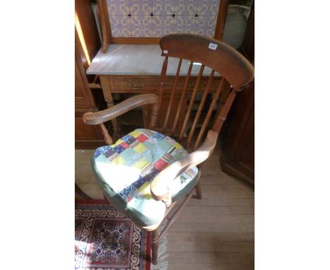 An elm seated stick back kitchen chair