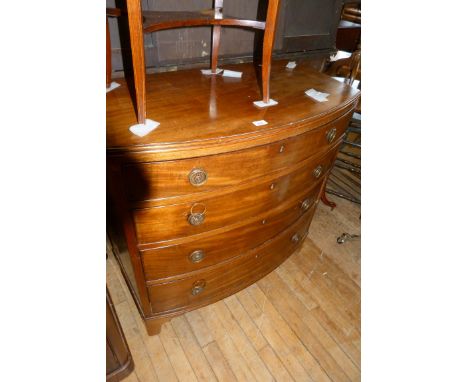 A 19th Century mahogany bowfront chest of four drawers on bracket feet
