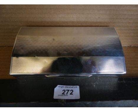 An early 20th Century silver cigarette case with wood lining and engine turned decoration, hallmarks indistinct 