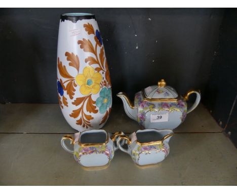 A Sadler three piece tea set together with a Dutch Haarlem floral decorated vase   CONDITION REPORT:  Teapot 7.5 inches from 