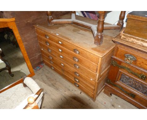 A light oak six drawer planners chest with metal cup handles 