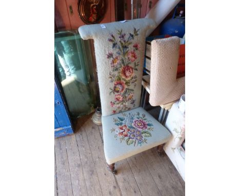 A Victorian floral tapestry covered prayer chair 