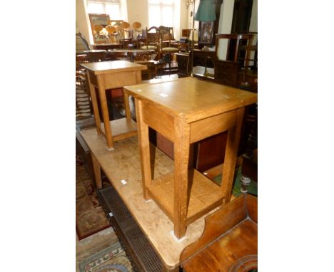 A pair of modern oak bedside/lamp tables