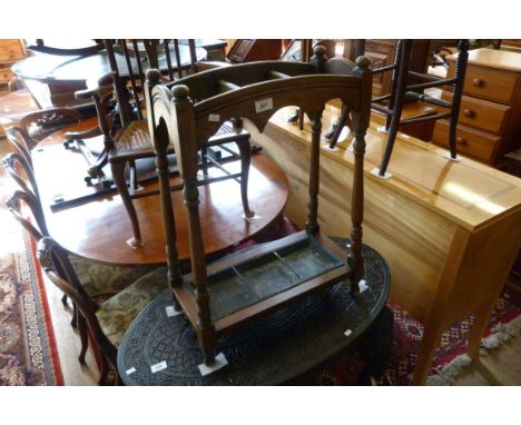 A 20th Century oak stick stand with removable metal tray 