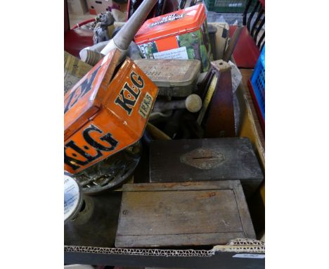A mixed lot comprising metronome, brass trivets, pestle and mortar's, small copper kettle, vintage tins, bells and other item