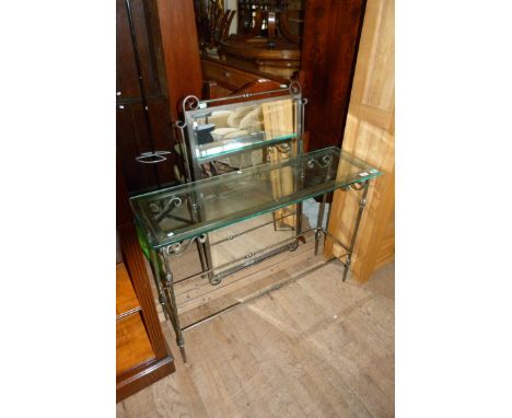 A contemporary gilt metal console table with mirror having silvered metal frame with glass top.