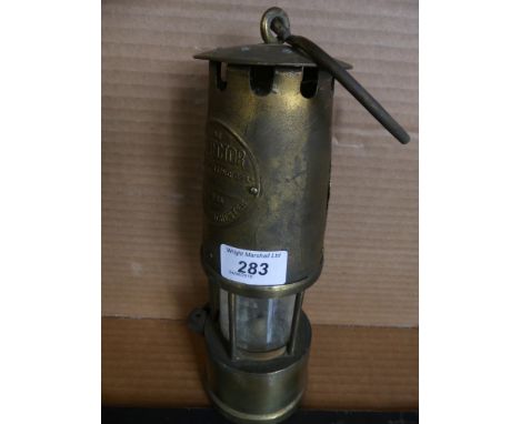 A Vintage Protector miner's lamp