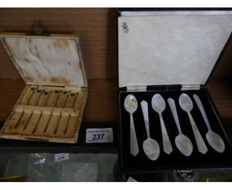 A mixed lot comprising a set of hallmarked silver and enamel cocktail sticks with cockerel finials, together with a cased set