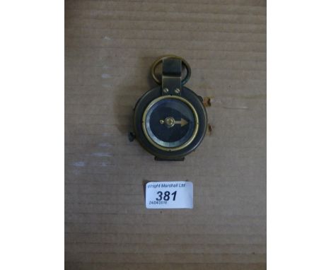 A small 20th Century brass cased military issue compass