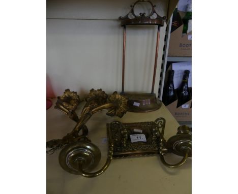 A mixed lot comprising a three branch gilt metal wall sconce, a small brass stick stand and a brass two branch wall sconce wi