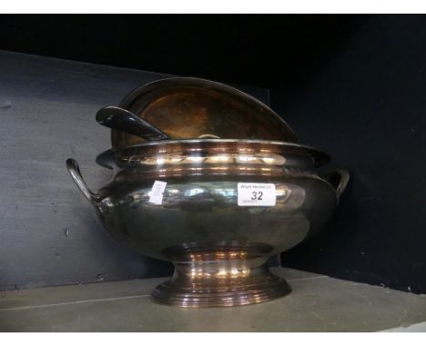 A silver-plated soup tureen with ladle and sauceboat.