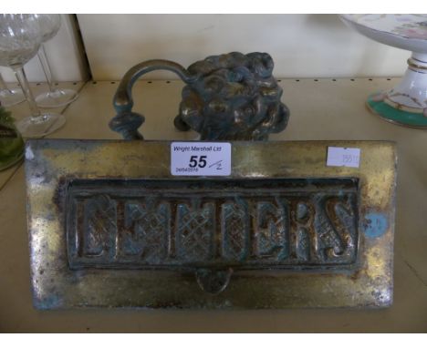 A brass lion head door knocker and a brass letter box (2)