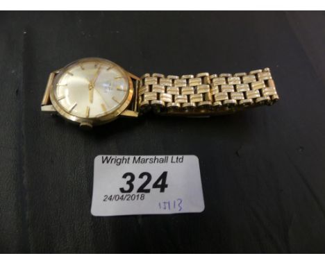A manual wind Tissot bracelet watch, with a precious yellow metal back