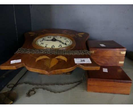 A mixed lot comprising an inlaid Continental wall clock together with a reproduction cased compass and a further cased reprod