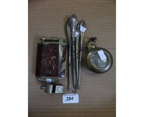 A mixed lot comprising silver mounted button hooks, an oversized cigarette lighter marked 'Polaire' an Acme Thunderer Whistle