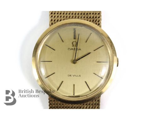 Gentleman's 9ct gold Omega De Ville dress watch. The watch having a gold 30mm face with baton dial, movement nr 27391904 case