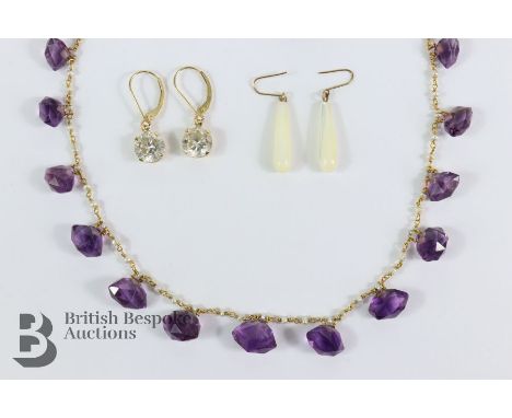 Amethyst and seed pearl necklace. The necklace set with thirteen amethyst approx 44 cms in length together with a 9ct gold am