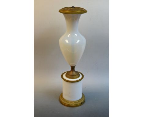 An early 20th century ormolu mounted opalescent glass ovoid pedestal table lamp, skirted base cast with a band of acanthus, 4