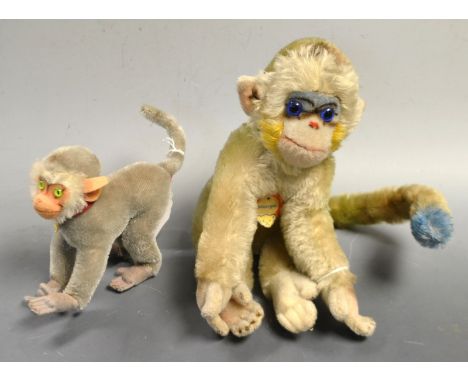 A Steiff (Germany) mohair Mungo the monkey, straw filled body, blue glass eyes, 22cm high, paper label, ear button lacking; a