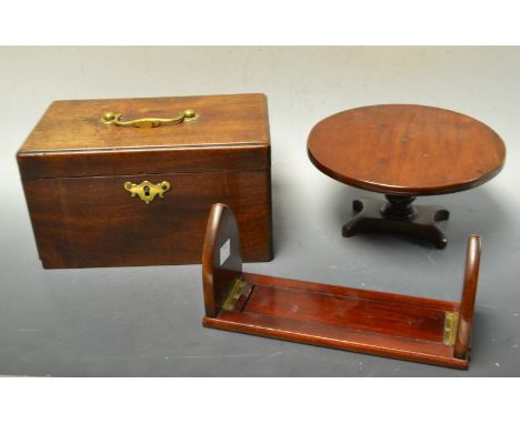 A George III mahogany tea caddy, brass swing handle, batwing escutcheon; a Victorian miniature mahogany breakfast table, turn