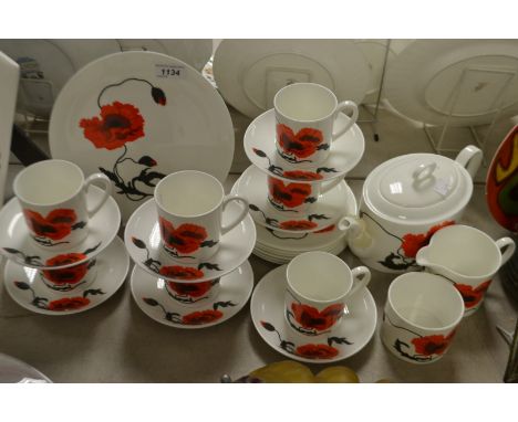 A Wedgwood Susie Cooper design Cornpoppy tea service including tea pot, milk and sugar