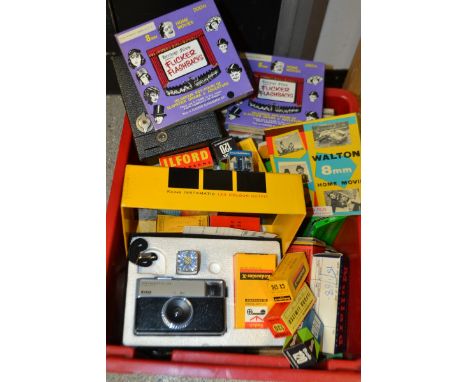 An Ensign E20 box camera; a Mansfield 8mm Metermatic movie camera , boxed; another box camera; a Kodak Instamatic 133 colour 